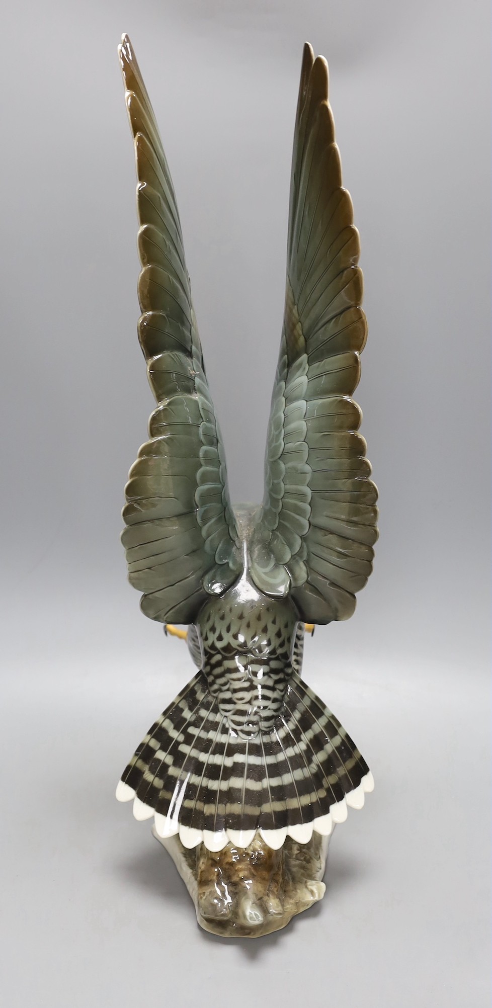 A large Hutschenreuther porcelain Peregrine falcon, 59cm